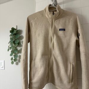 Patagonia Beige Fleece Jacket with Black Logo Tag